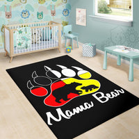 Black baby room rug with multicolor bear paw print design and “Mama Bear” lettering