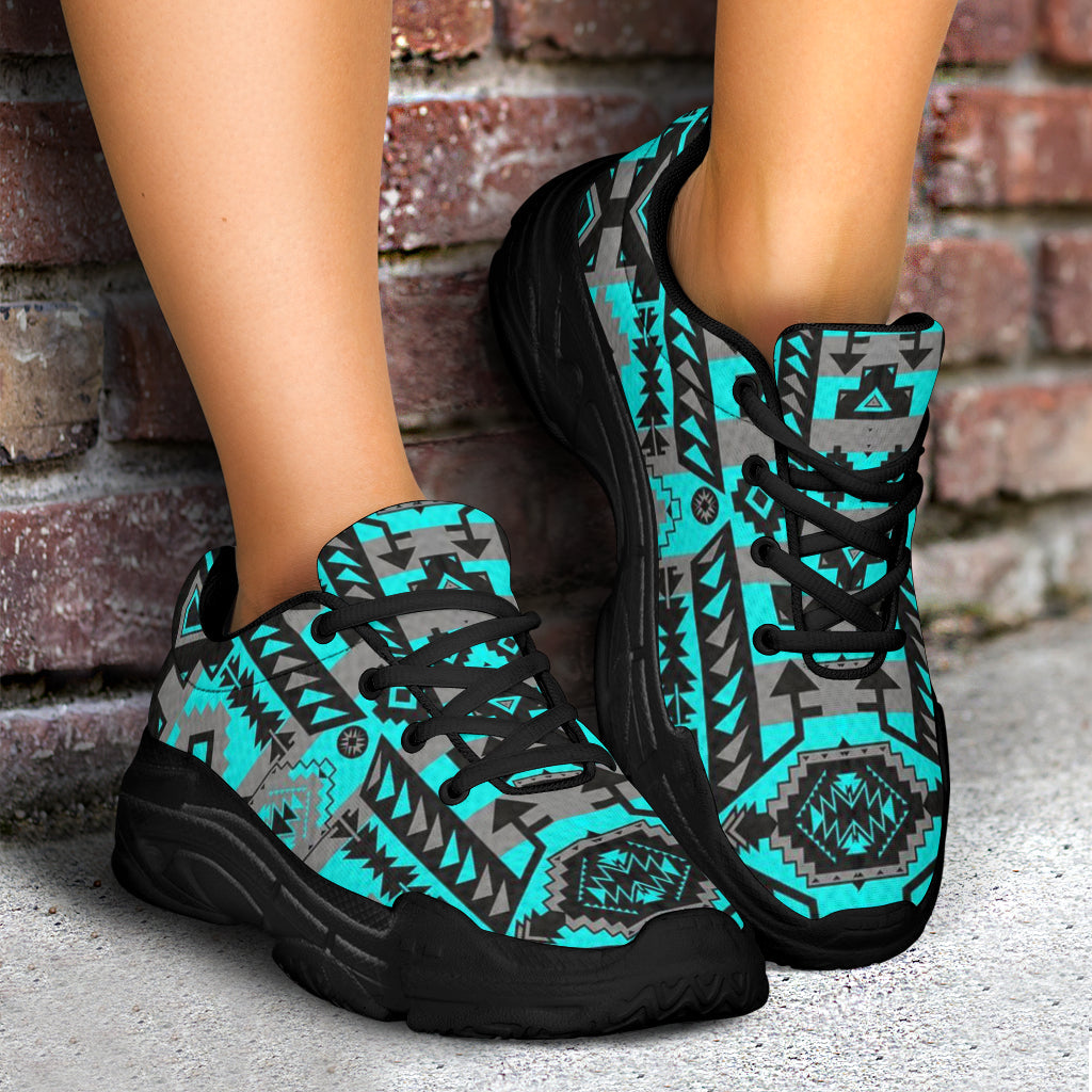 Chunky sneakers side and heel, turquoise geometric print on gray with black outsole