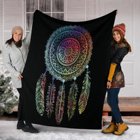Black dreamcatcher throw blanket held up, colorful mandala and hanging feather pattern