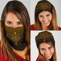 Viking neck gaiter on woman, dark fabric with gold knot emblem and star accents