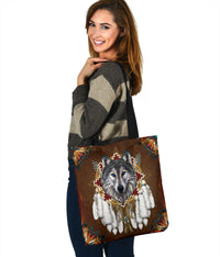 Brown wolf tote bag with black top handle and multicolor mandala-style corner details