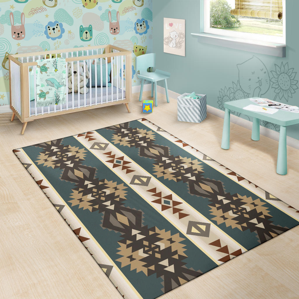 Kids room rug: teal geometric pattern with tan motifs and cream stripe border