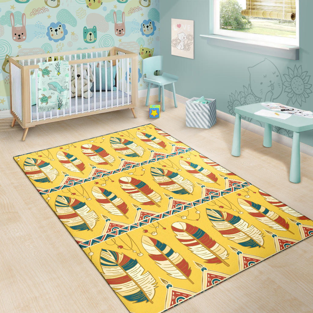Kids room area rug with yellow feather pattern and bright multicolor border