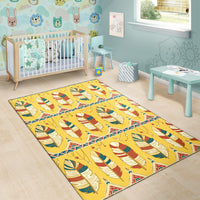 Kids room area rug with yellow feather pattern and bright multicolor border