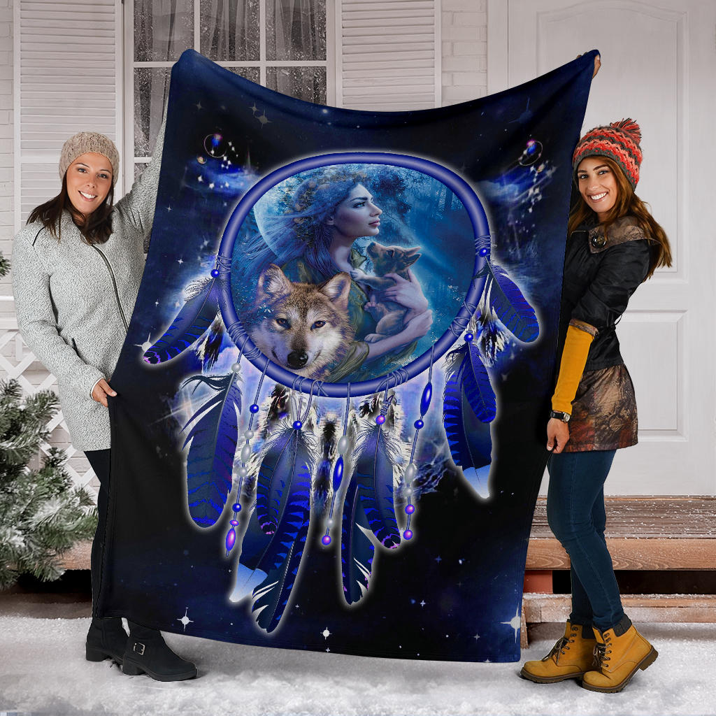 Blue dreamcatcher blanket stretched on front display, featuring girl-and-wolf central print