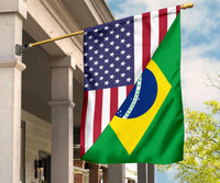 Flag on a pole with US stars and stripes and diagonal Brazil flag triangle