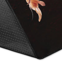 Corner detail of multicolor area rug with black border and feather graphic
