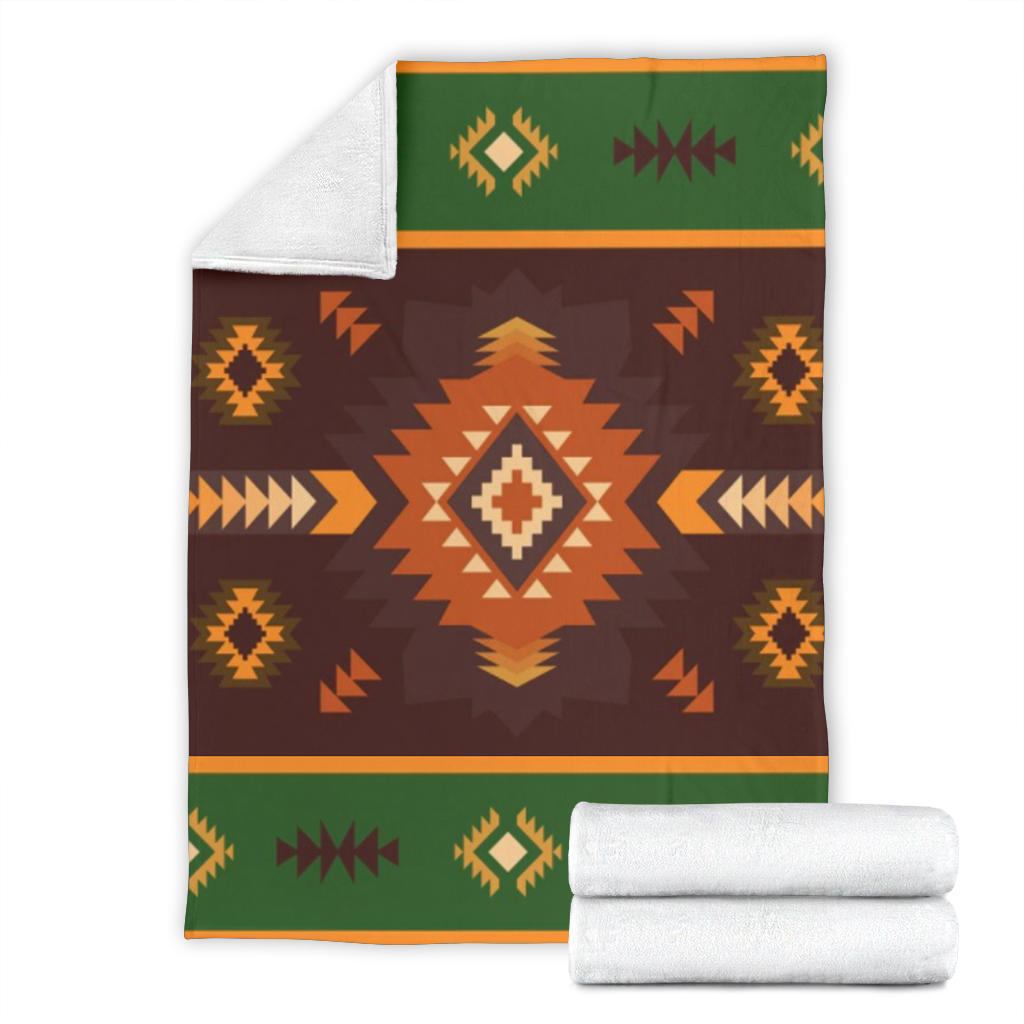 Geometric seamless blanket set with folded white backing, dark brown and green patterned front