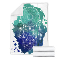 Blue and green dream catcher blanket set, folded view with teal web and blue feathers