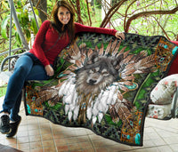 Wolf mandala quilt on patio, green multicolor tribal design with turquoise corner accents