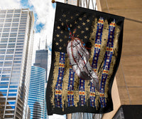 Close view of feather flag artwork: star field, feather, and blue vertical stripes