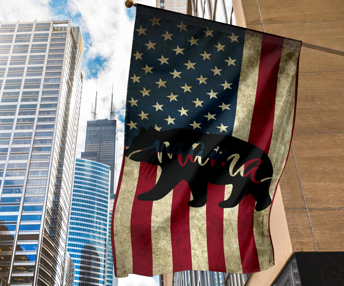 Tall star-and-stripe flag with black bear and 'mama' script, multicolor