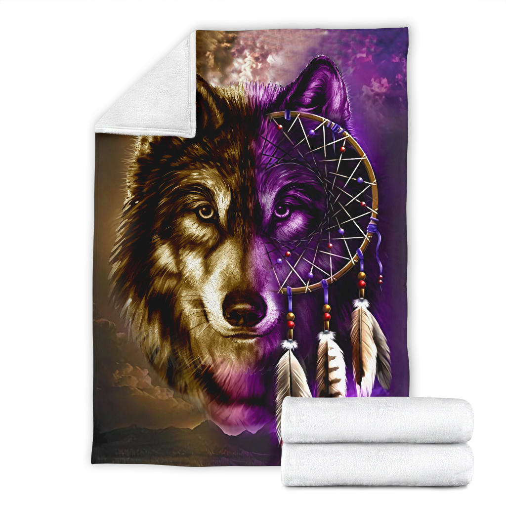 Wolf and purple dreamcatcher blanket shown with rolled white towels