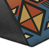 Close-up corner of Southwest rug showing geometric shapes and dotted texture on dark edge