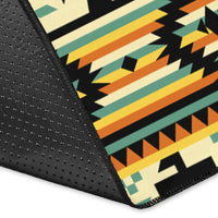 Close-up corner of multicolor geometric area rug with black edge and stitching