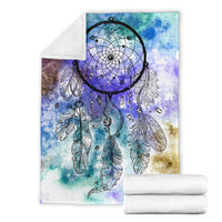 Dream catcher blanket set showing folded blanket and white backing, multicolor feather print