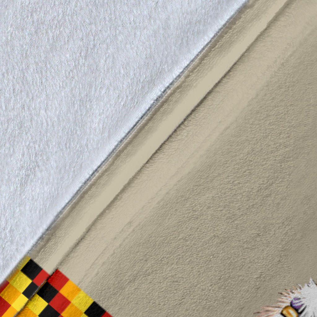 Close-up: beige fabric edge with white pile texture and multicolor checkered trim strip