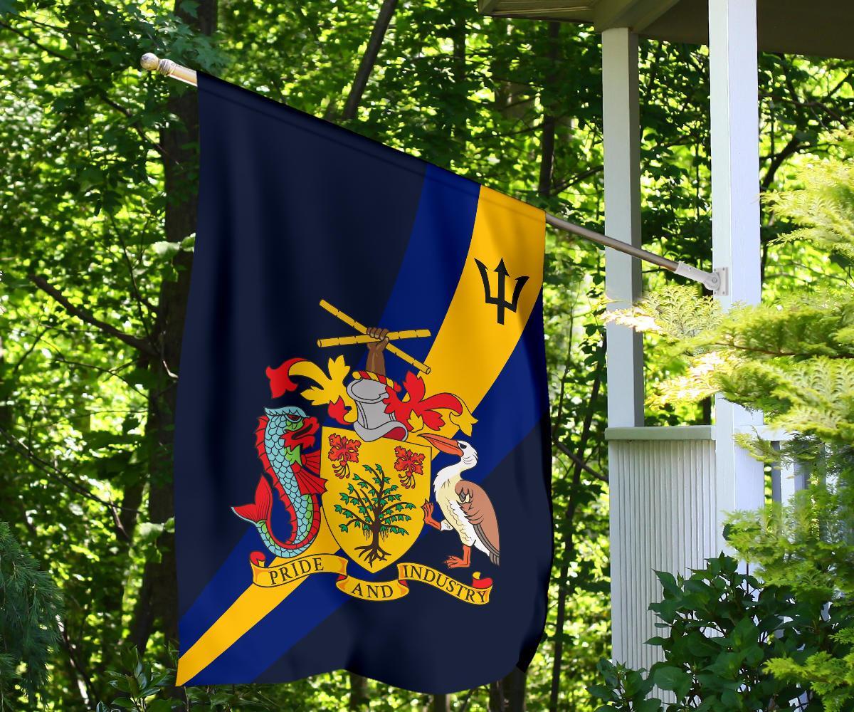 Barbados flag on outdoor railing, blue/yellow diagonal coat of arms