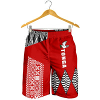 Red shorts on hanger with elastic waistband; black-and-white geometric trim