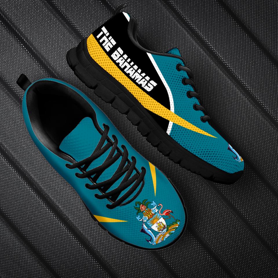 Bahamas active sneakers, blue uppers with crest, black sole, yellow side stripe