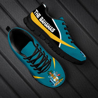Bahamas active sneakers, blue uppers with crest, black sole, yellow side stripe