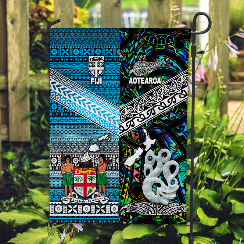 new-zealand-and-fiji-flag-together-paua-shell