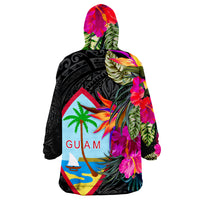 Wearable blanket hoodie, black tropical Guam print with flowers and palms, rear view