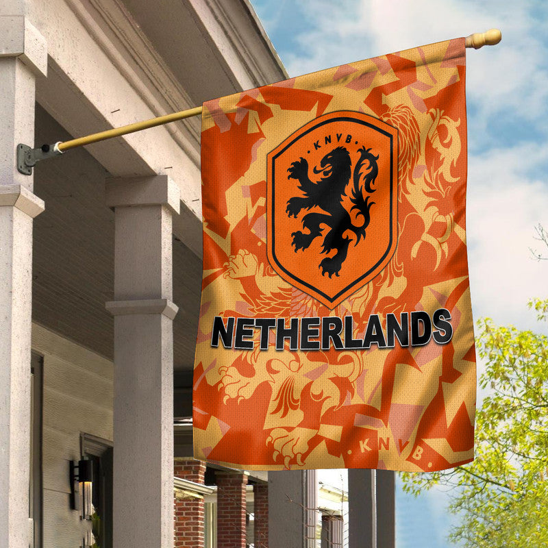 Orange soccer team flag with KNVB lion crest and NETHERLANDS text