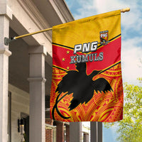 PNG Kumuls house flag on a pole, yellow and red design with black bird