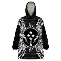 Wearable blanket hoodie in black with white tribal print and star emblem, hooded front