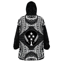 Wearable blanket hoodie in black with white tribal print, star-and-laurel emblem, hooded back