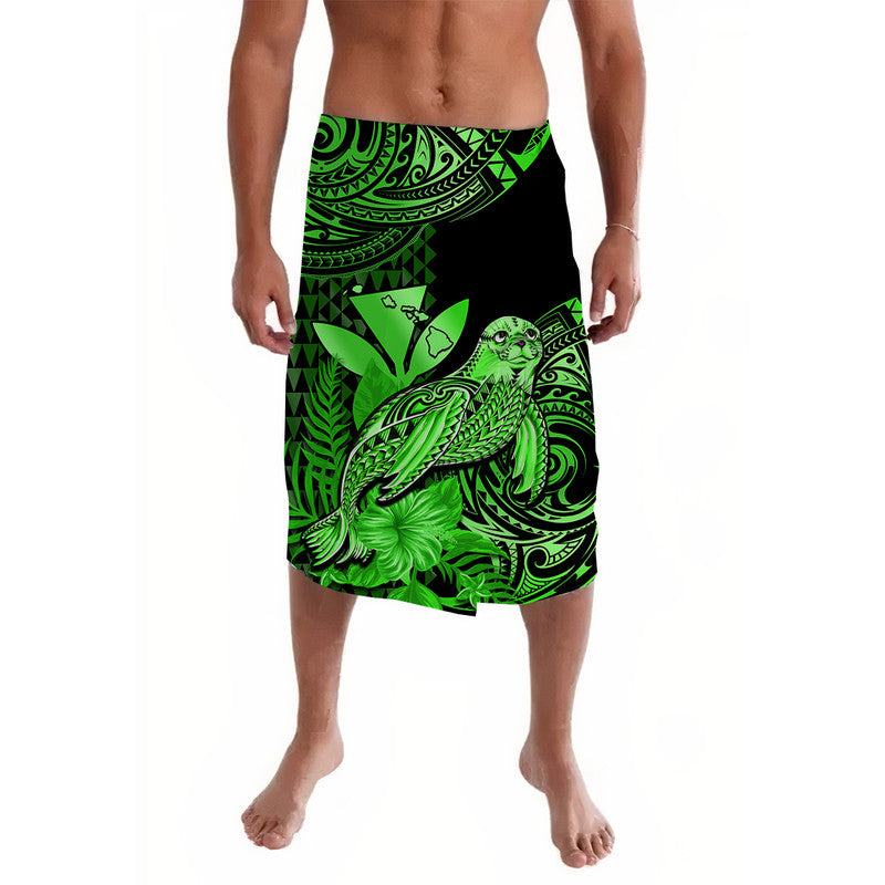 Green and black Polynesian lavalava with monk seal and tiki patterns
