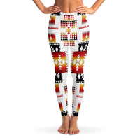 White women’s leggings with full-length geometric print in red, black, and gold