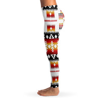 Side view of women’s leggings: white background with red, black, and gold shapes