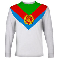 White long-sleeve T-shirt with tricolor triangular design and gold wreath emblem