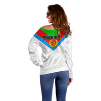 White off-shoulder sweater with back colorful chevron crest graphic