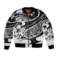 Black bomber jacket with Polynesian tribal print, full-zip front, ribbed cuffs and hem.