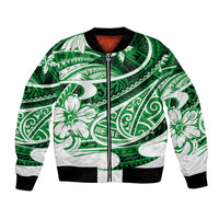 Green bomber jacket with Polynesian tribal print, front zipper, black ribbed cuffs and hem.