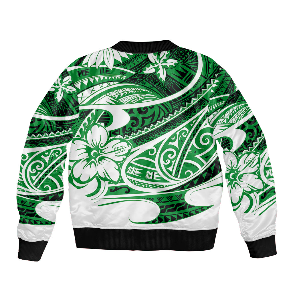 Green bomber jacket with Polynesian tribal print, ribbed hem and cuffs, full-length sleeves.