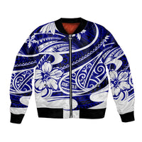 Blue bomber jacket with full zip, black ribbed collar and hem, white Polynesian tribal print