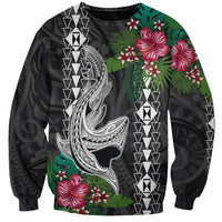 Unisex black sweatshirt with green tropical print, pink hibiscus, and shark artwork