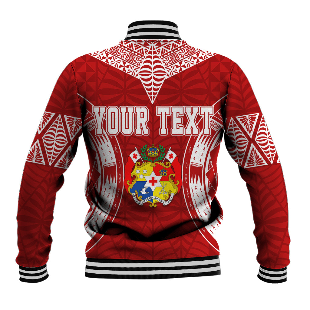Red baseball jacket back with white geometric print, hood-like neck yoke, striped hem