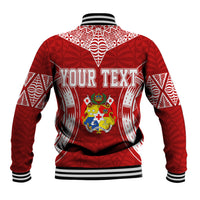 Red baseball jacket back with white geometric print, hood-like neck yoke, striped hem