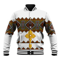 White baseball jacket with colorful geometric print, gold cross emblem, striped ribbed cuffs