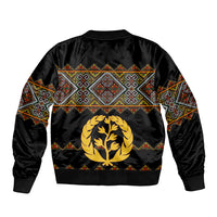 Black bomber jacket with back crest and geometric dash stripe pattern