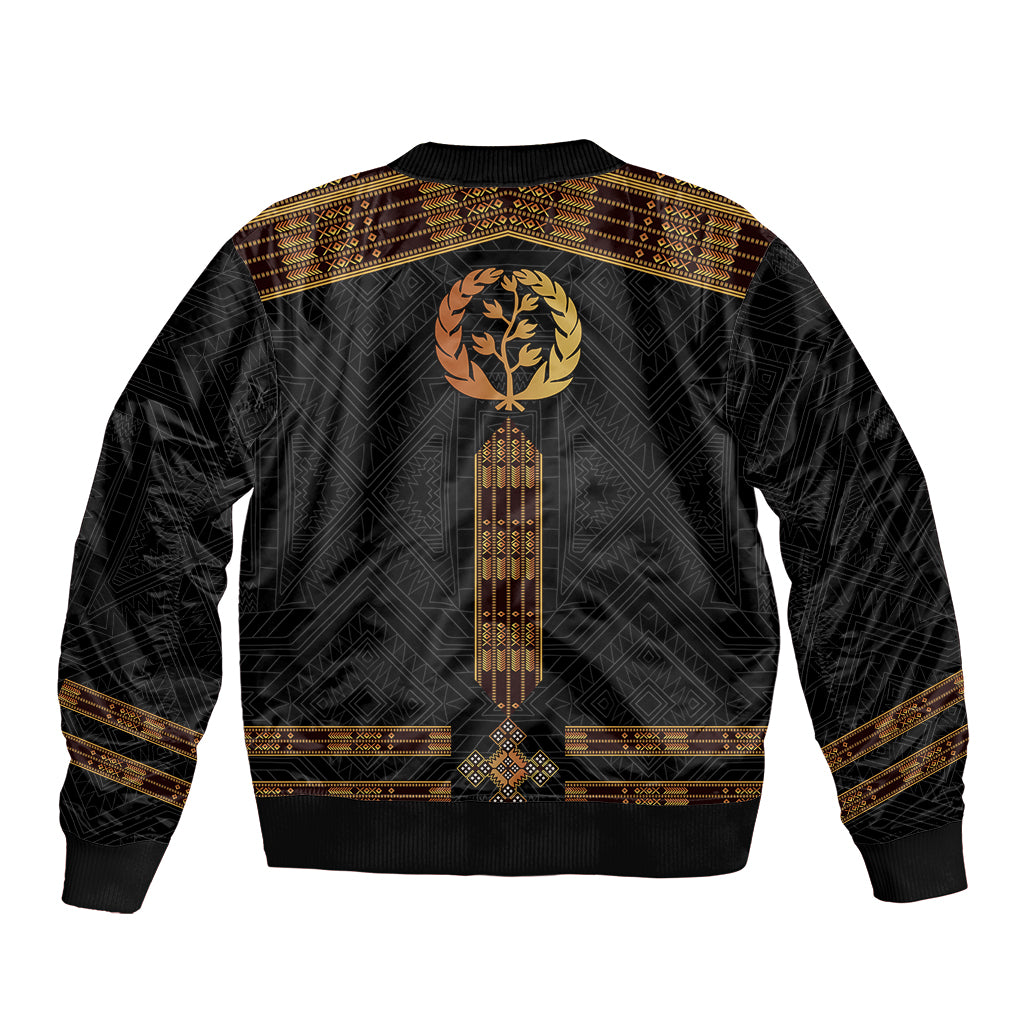 Black bomber jacket with gold emblem wreath, vertical patterned panel, ribbed hem and cuffs.