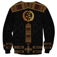 Unisex black sweatshirt with gold laurel crest, central vertical panel, and patterned cuffs