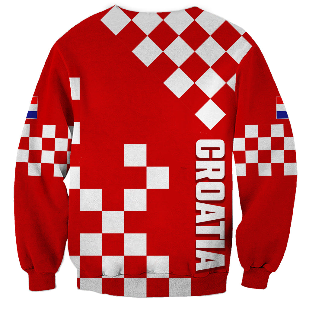 Red sweatshirt with white checkerboard squares and large HRVATSKA graphic on back.