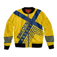 Yellow and blue bomber jacket with zip front and striped sleeve cuffs.