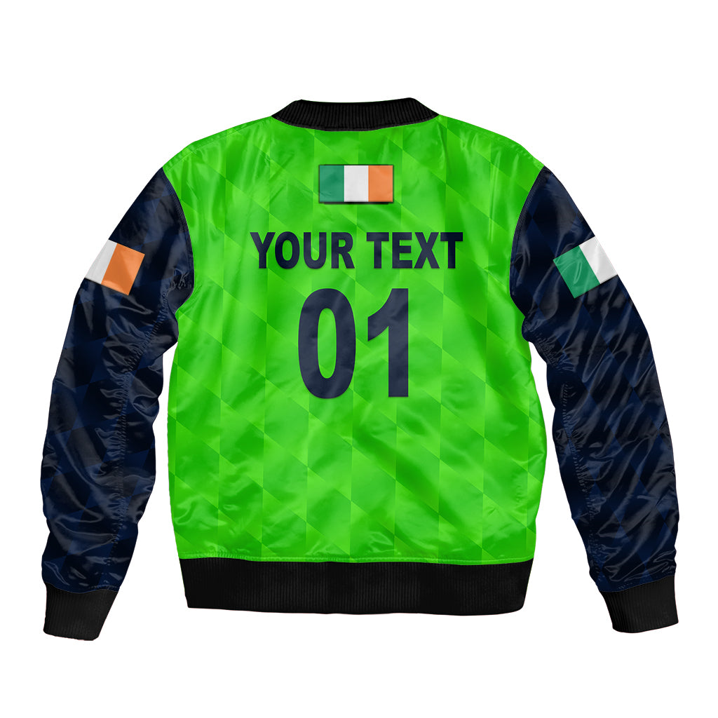 Green cricket bomber jacket with navy sleeves, back print “YOUR TEXT 01”, ribbed hem